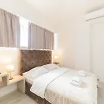 Lukas By Belmont Realty *